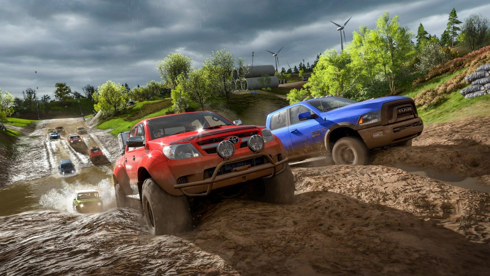 An image of two trucks racing through the mud in Forza Horizon 4.