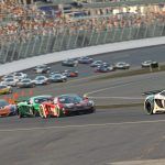 A load of McLaren MP4-12C GT3 cars on iRacing heading into Daytona Road Course Turn 1