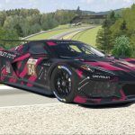 A Corvette C8.R in Lazarus black/pink with Mosport in the background