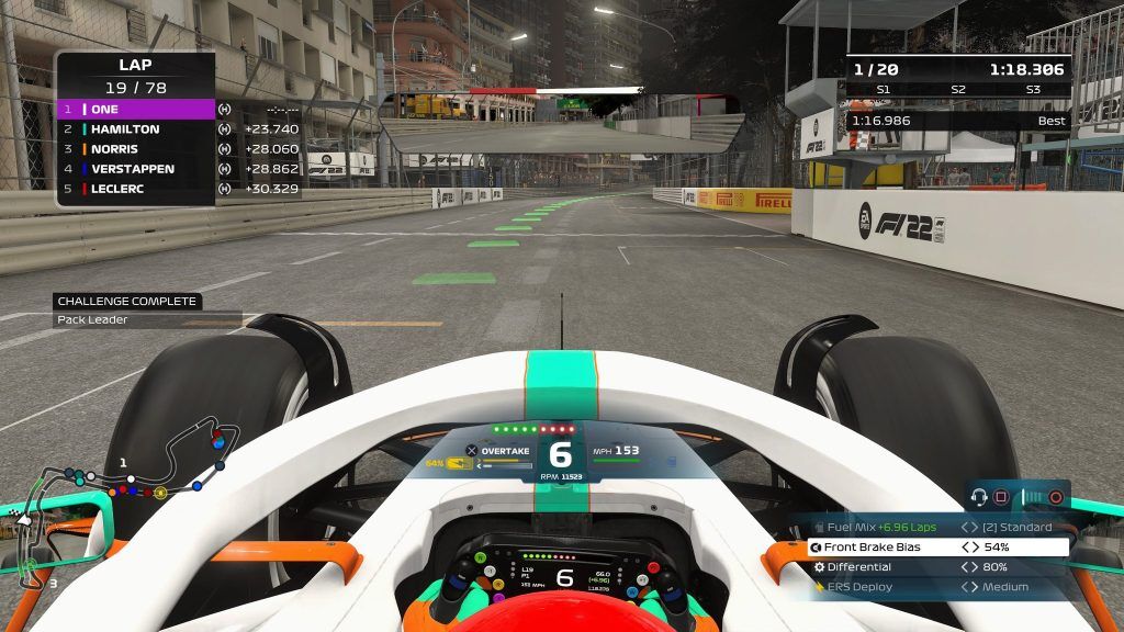 Onboard from F1 22 Monaco at night-time with a menu saying Challenge Complete.