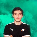 An image of Diogo Pinto in front of a teal background.