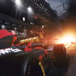 F1 car with Infinity Ward logo in a dim lit pit garage.