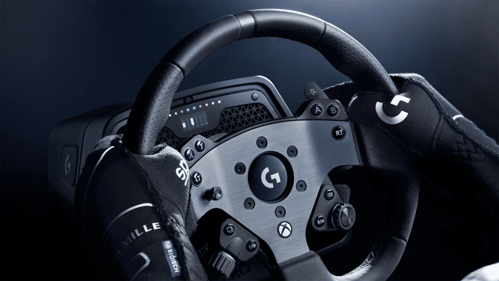 A Logitech G Pro wheel being gripped by someone wearing racing gloves.