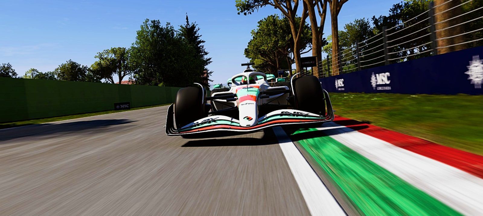 An image of an OverTake liveried F1 car racing at Imola in F1 23.