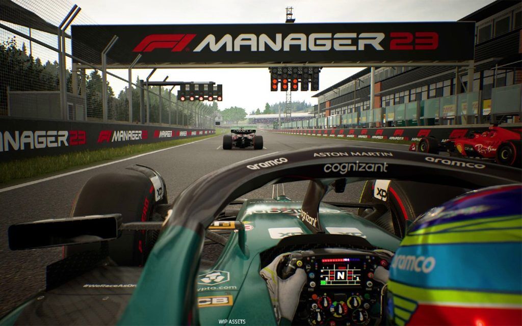 An onboard view of a green F1 car on the grid for the start of a race.