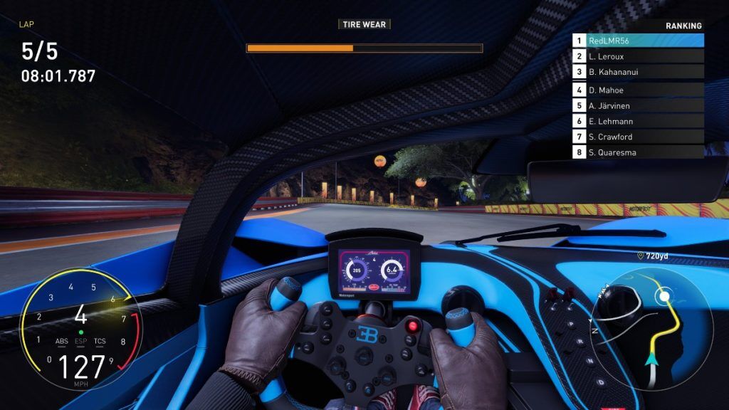 Interior view of the Bugatti Bolide with a tyre wear bar at the top of the screen.