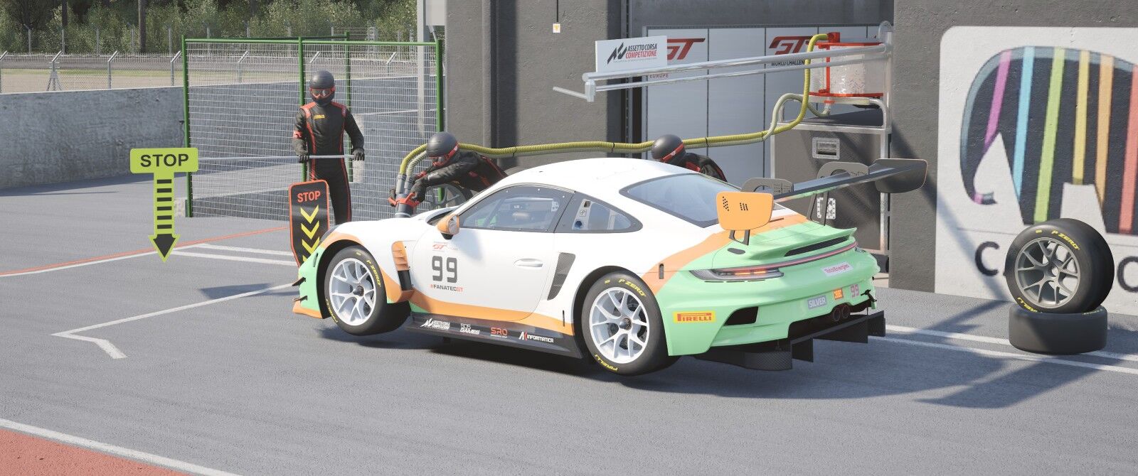 A Porsche racecar in the OverTake colours white, teal and orange.