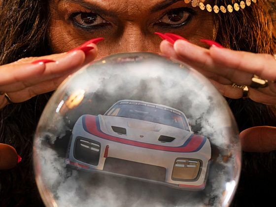 A crystal ball with a Porsche 935 sportscar in it.