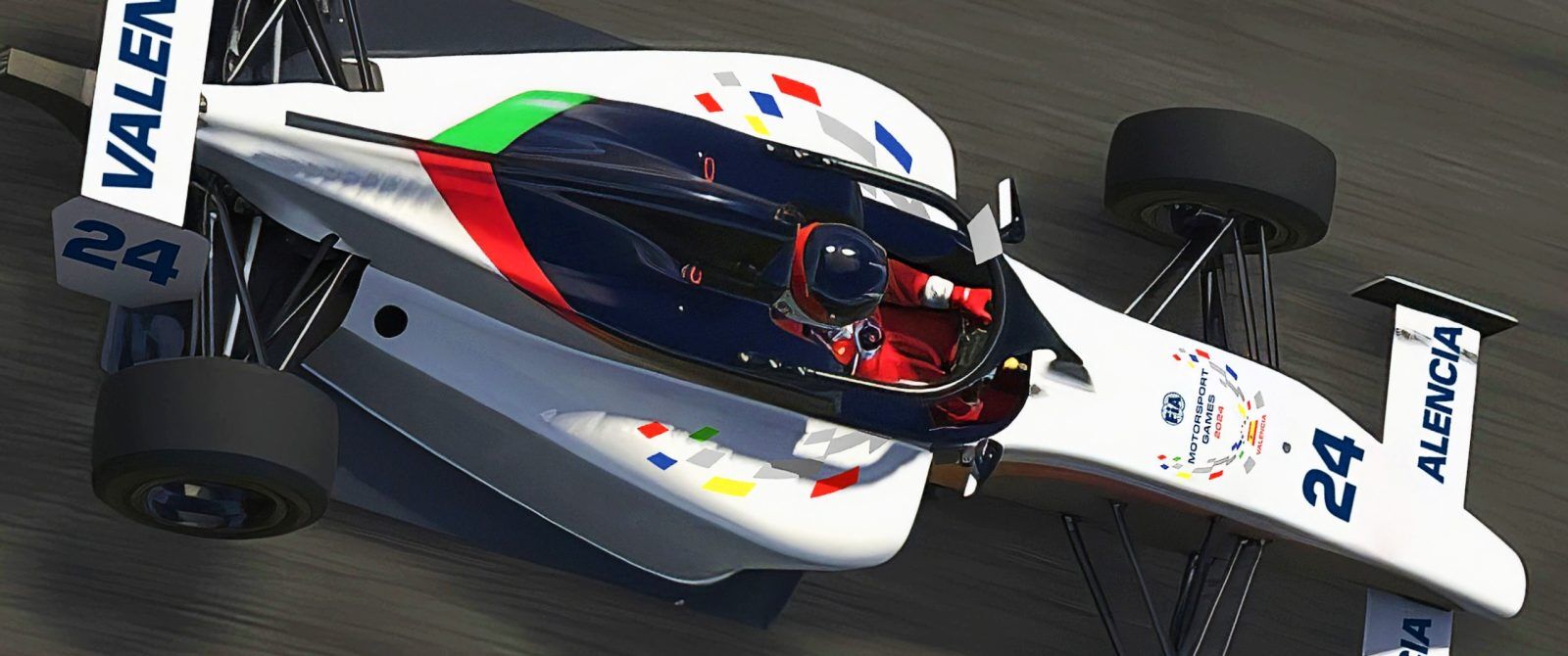 A white single seater car with FIA logos and the word Valencia written on the front and rear wings.