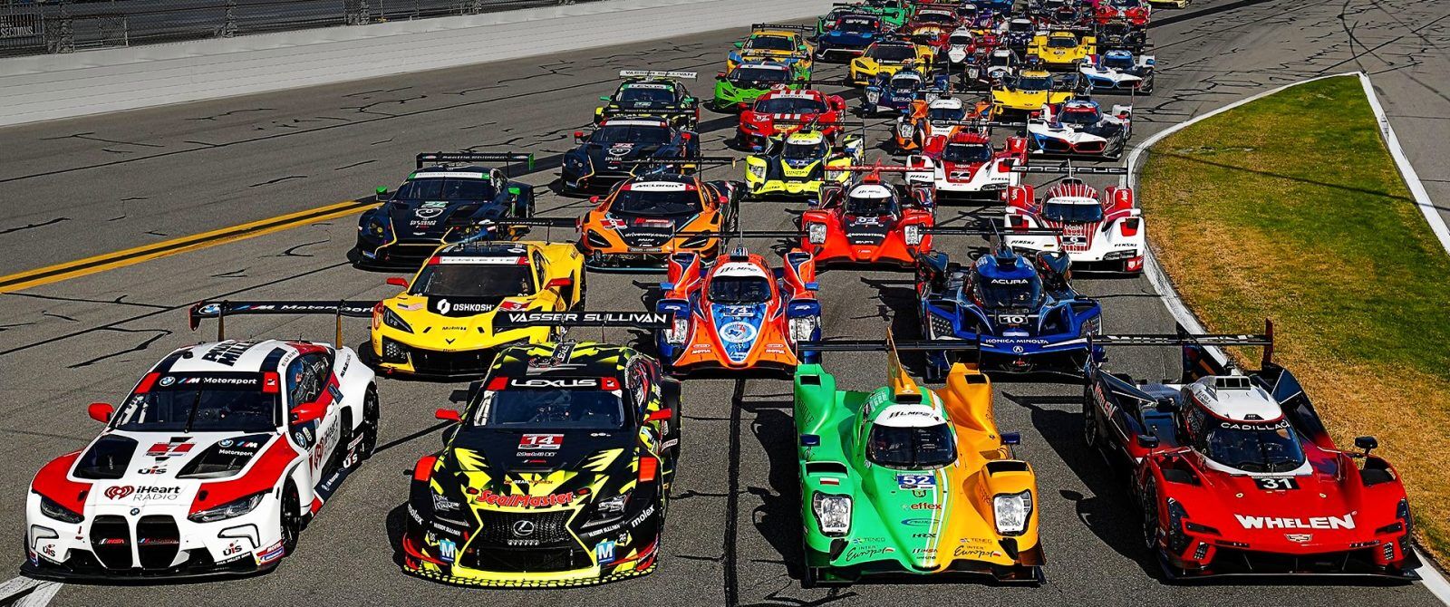 A line of cars racing in the 2024 24 hours of Daytona.