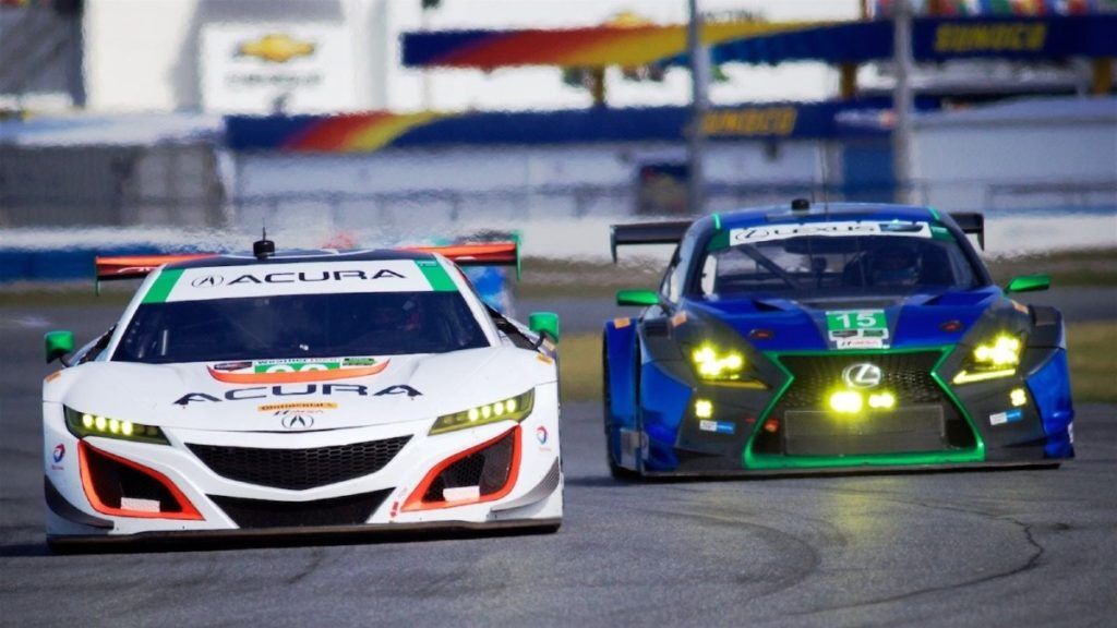Two racing cars, Acura NSX on the left and Lexus RC F on the right.
