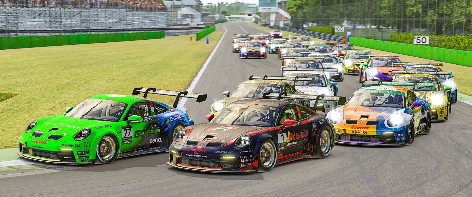 A collection of Porsche Cup cars navigating a tight corner on a racetrack.