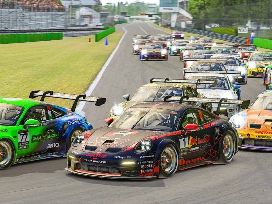 A collection of Porsche Cup cars navigating a tight corner on a racetrack.